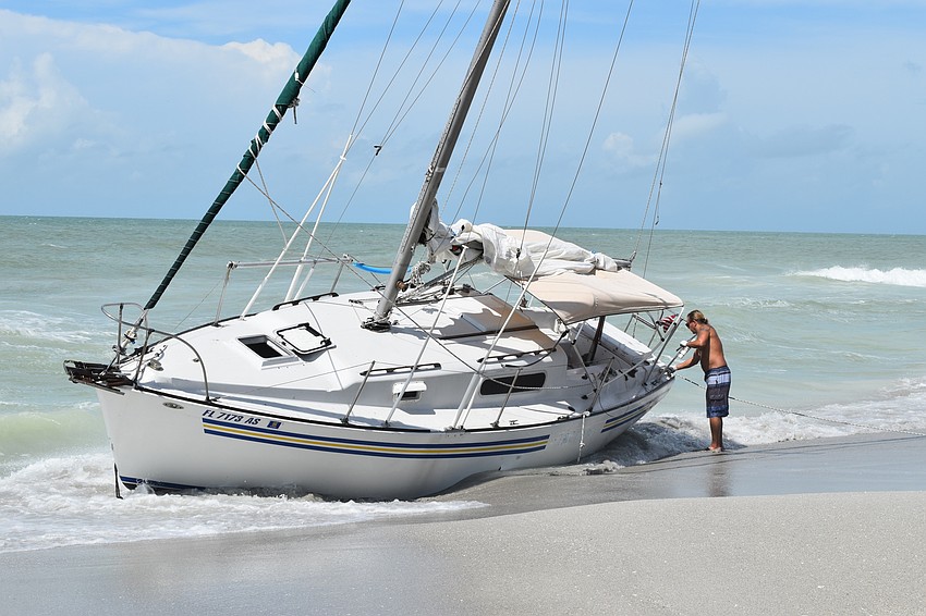 Sept. 24: The sailboat was washed ashore in mid-September.