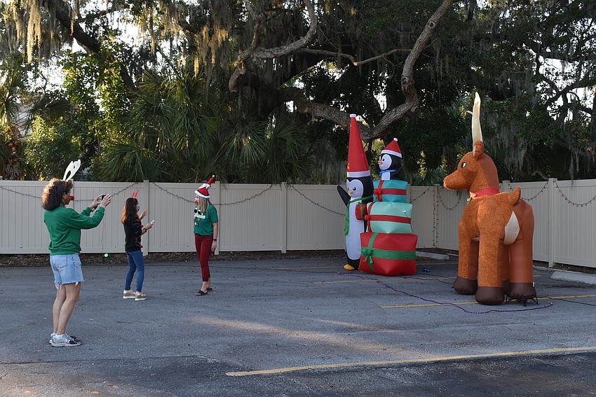 Gina Jordan snaps a photo of the displays.