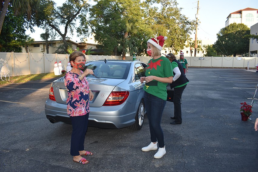 Louisa Goldman catches up with Jessica Hays after dropping off her gifts.