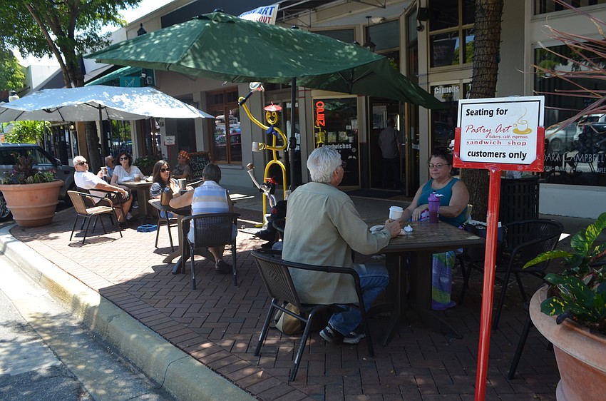 May 7: Sidewalk dining became popular when state officials allowed restaurants to reopen with a fraction of normal capacity indoors and outdoor seating spaced six feed apart.