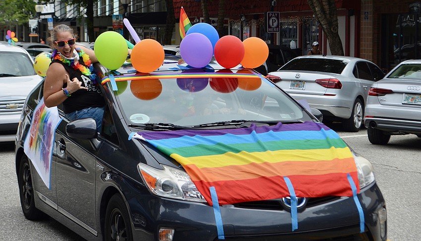 June 18: About two dozen decorated cars and trucks took part in the Project Pride SRQ parade.