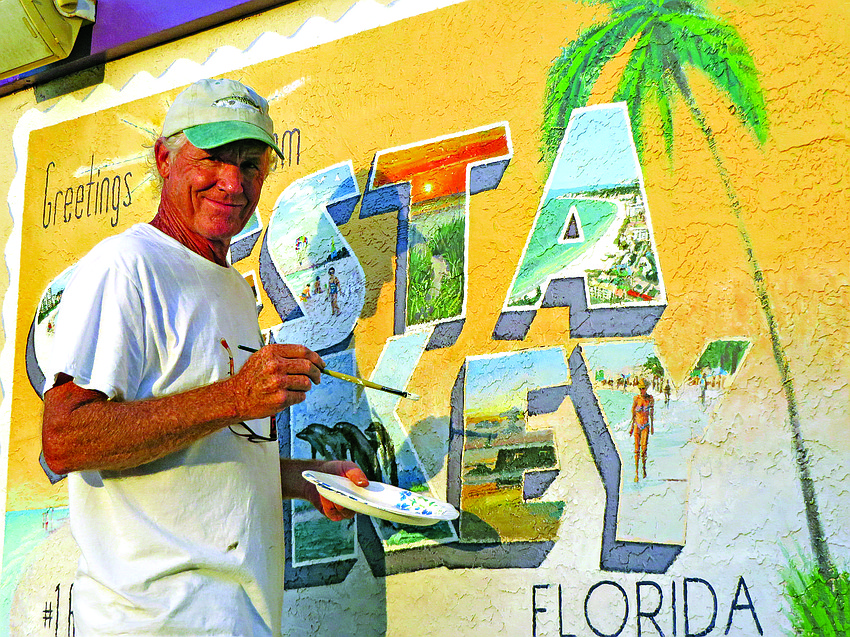 Sept. 10: Shawn McLoughlin paints a mural welcoming people to Siesta Key.