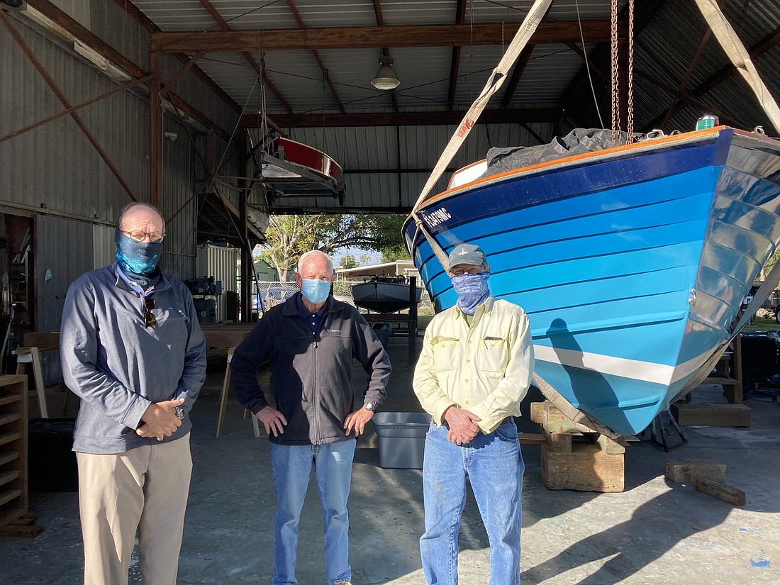 Gulf Coast Maritime Museum board members Chad Weiss, John Pether and Pat Ball stand in the former boat-building studio of George Luzier. The group wants to build a museum to chronicle the history of boating in Florida.