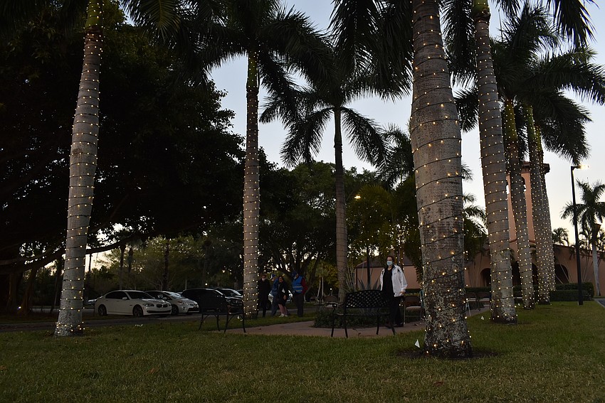 Twinkling lights wrapped the palm trees outside of the church.