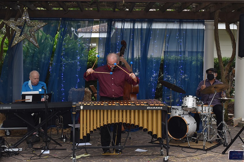 Dave Morgan plays marimba.