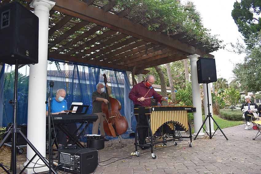 Dave Morgan and his ensemble provide lively tunes for the crowd.