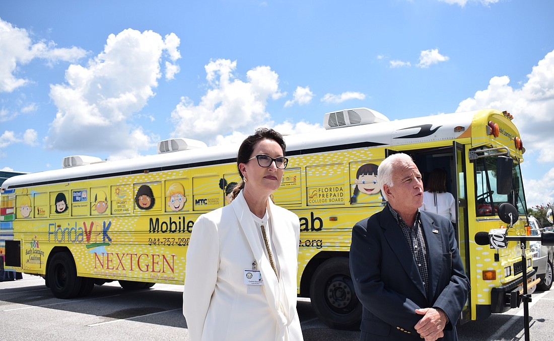 Cynthia Saunders, superintendent of the School District of Manatee County, and Paul Sharff, the CEO of the Early Learning Coalition of Manatee County, talk about the new Mobile Learning Lab. File photo.