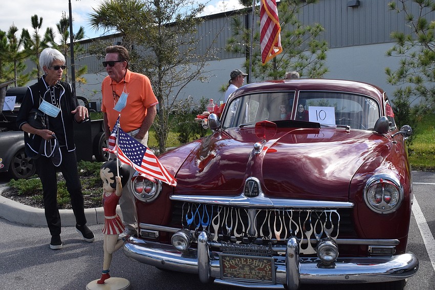 Lakewood Ranch's Roxanne and Rod Leezer look at a vintage car. 