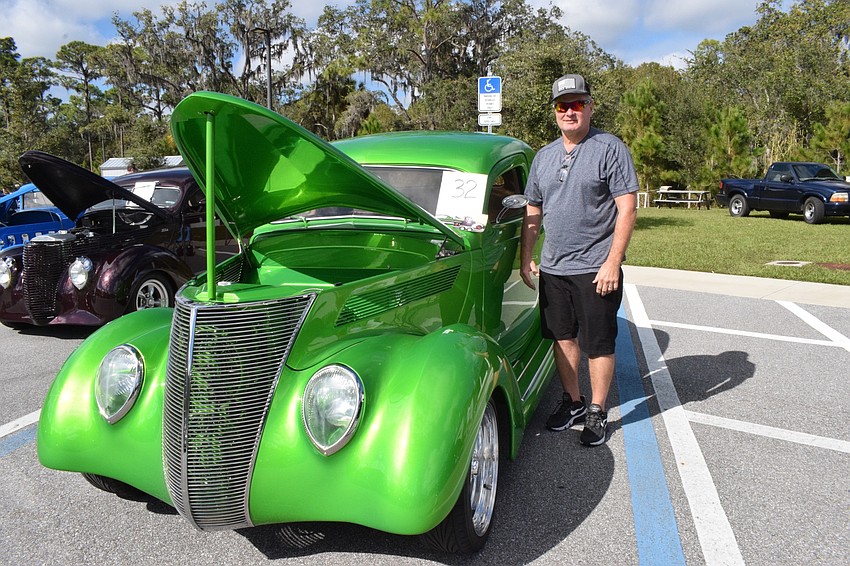 Lakewood Ranch's Dave Similo shows off his 1937 Ford that took him seven years to do more than 23 modifications .
