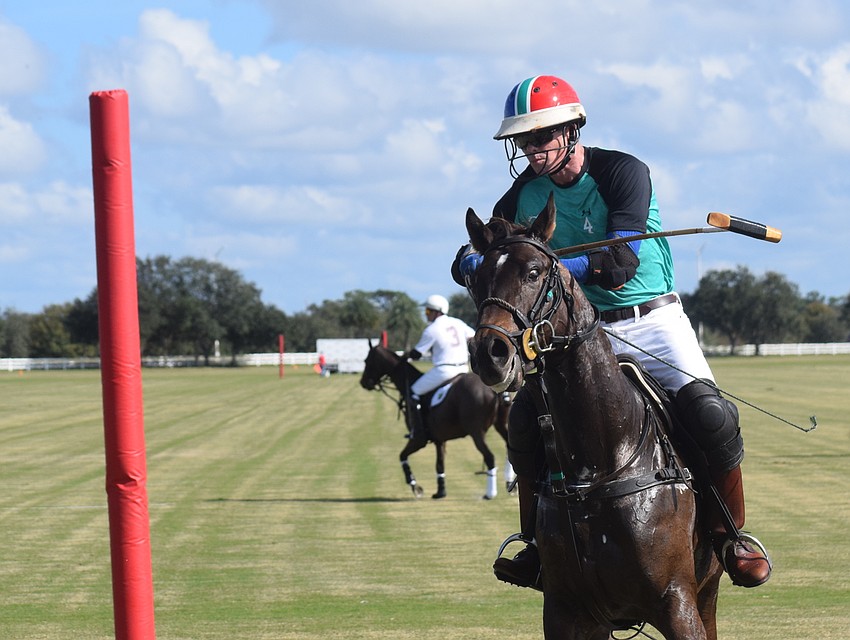 Epic Equine's Stuart Campbell comes through the goal mouth after scoring.