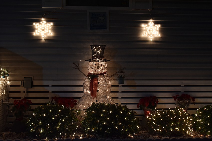 Unit G1 has a friendly snowman standing watch.