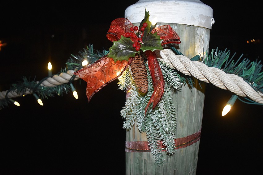 The dock is festive in day and night.