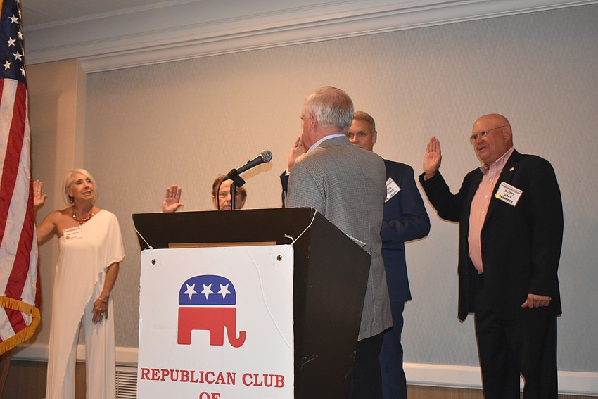 Acting chairman of the Sarasota Republican Party Jack Brill swore in the new board.