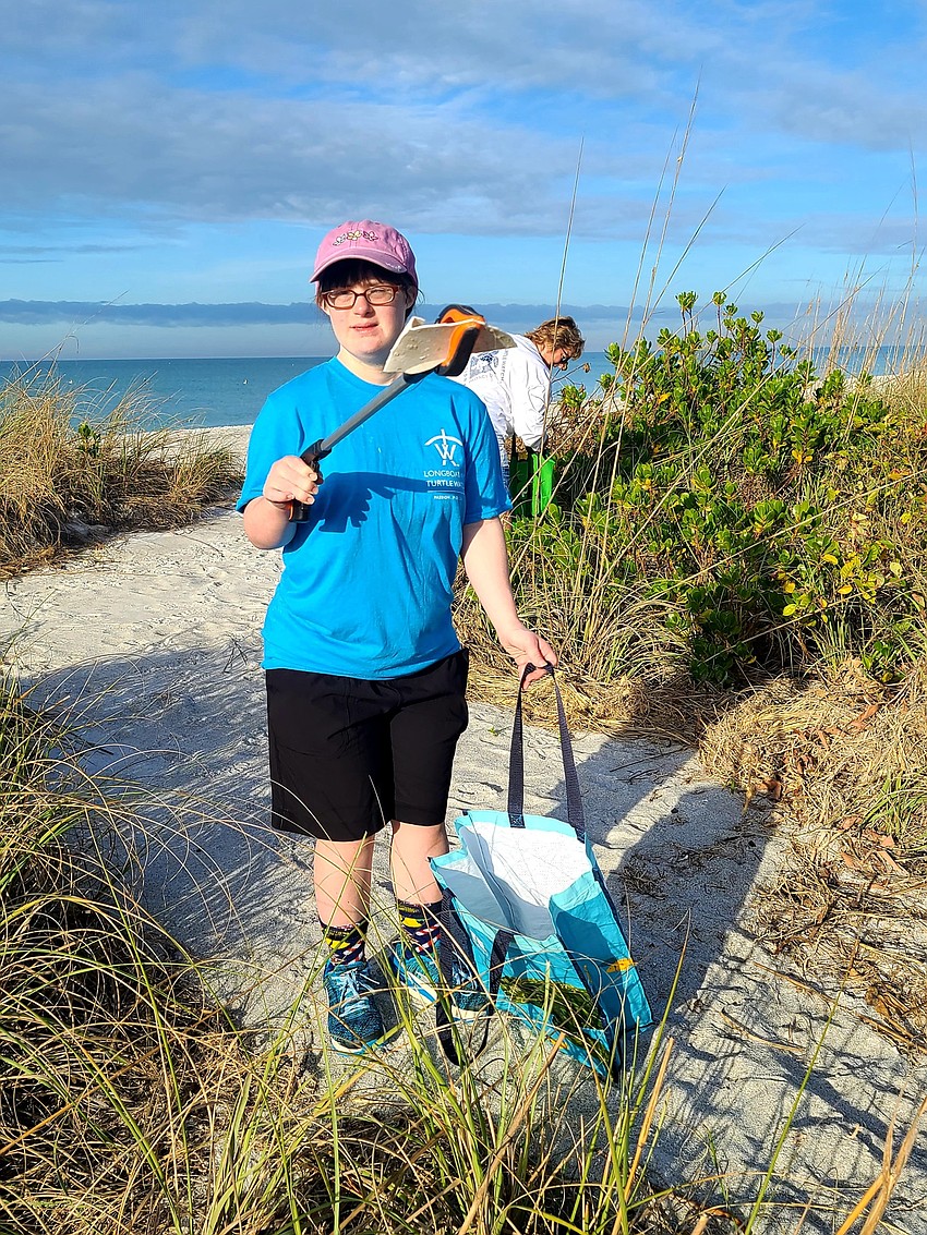 Ayla Sellers with her haul of trash. Courtesy photo.
