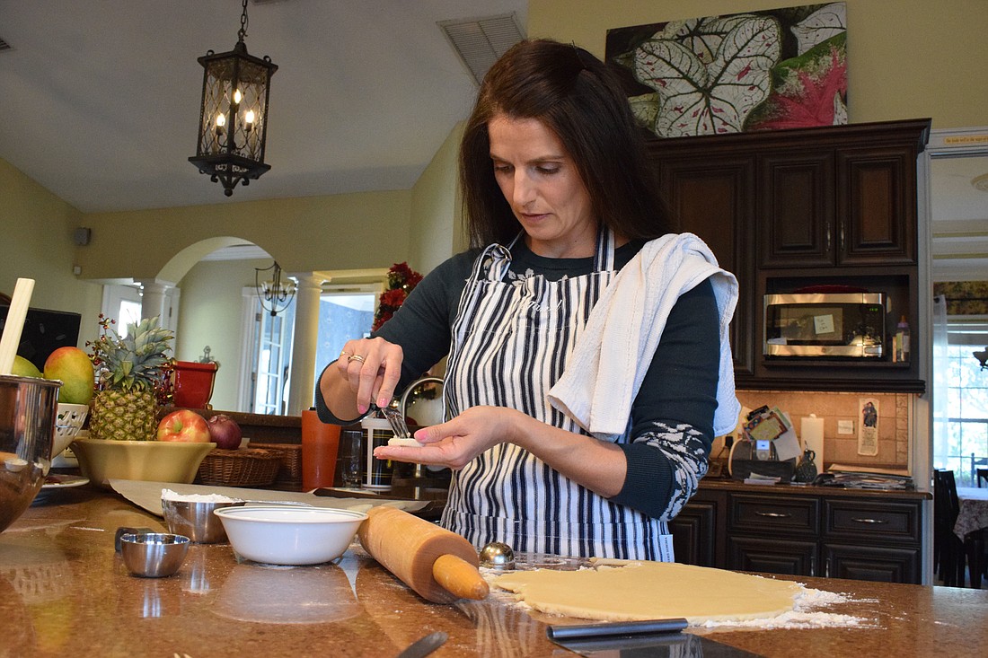Myakka&#39;s Sarah Wiegand bakes cream wafers from scratch. The cookies are a Christmas tradition for her family.