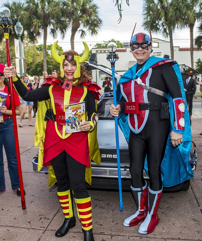 Dr. Larry and Pat Thompson arrive as “Captain Creative and The Imaginator” in a 1982 DeLorean