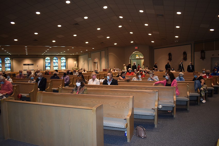 Members filed in and kept a pew between them. Usually, only one or two couples sat in each pew.