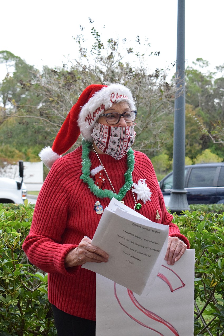 Pat Langhirt gets into the Christmas spirit while singing classic Christmas songs.