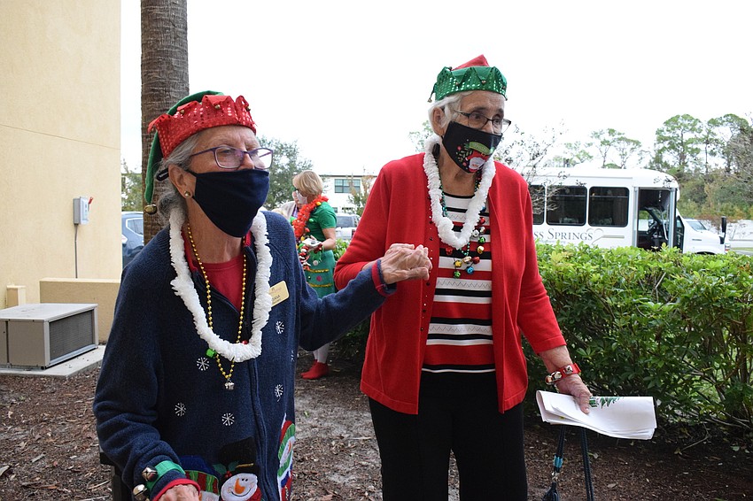 Diana Healey and Marietta Huggard add some dance moves to their singing.