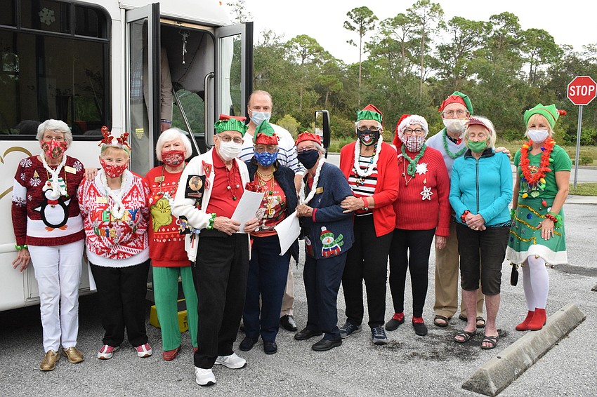 Residents of Cypress Springs Gracious Retirement Living surprise Rosie Breitwieser, a resident who is recovering from broken ribs at Hawthorne Village Healthcare and Rehabilitation, by singing holiday songs outside her window.