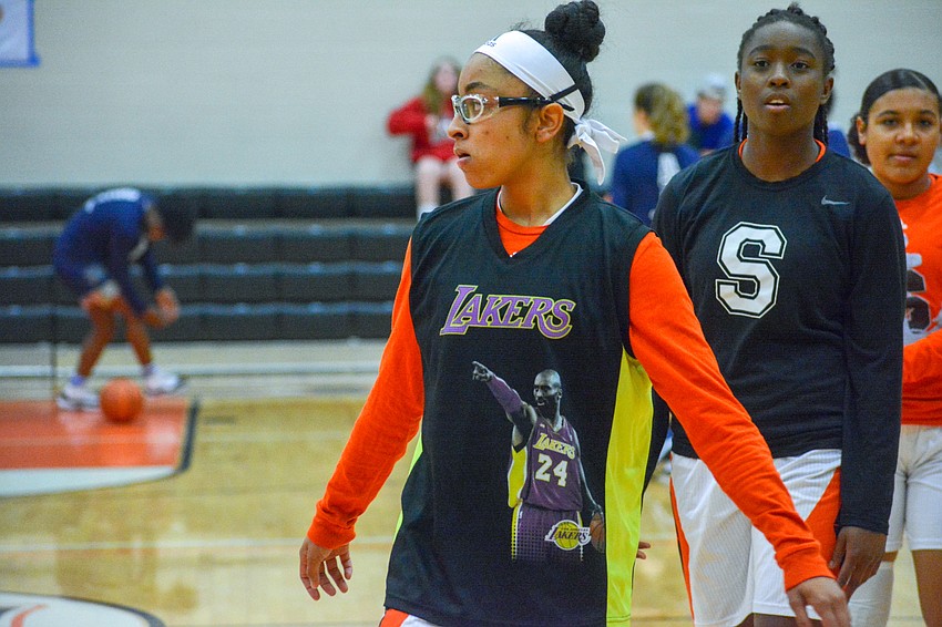 Then-Sarasota High junior girls basketball player Cheyenne Stubbs dons a customized Kobe Bryant jersey during warm-ups of the Sailors' game against North Port High on Jan. 27.