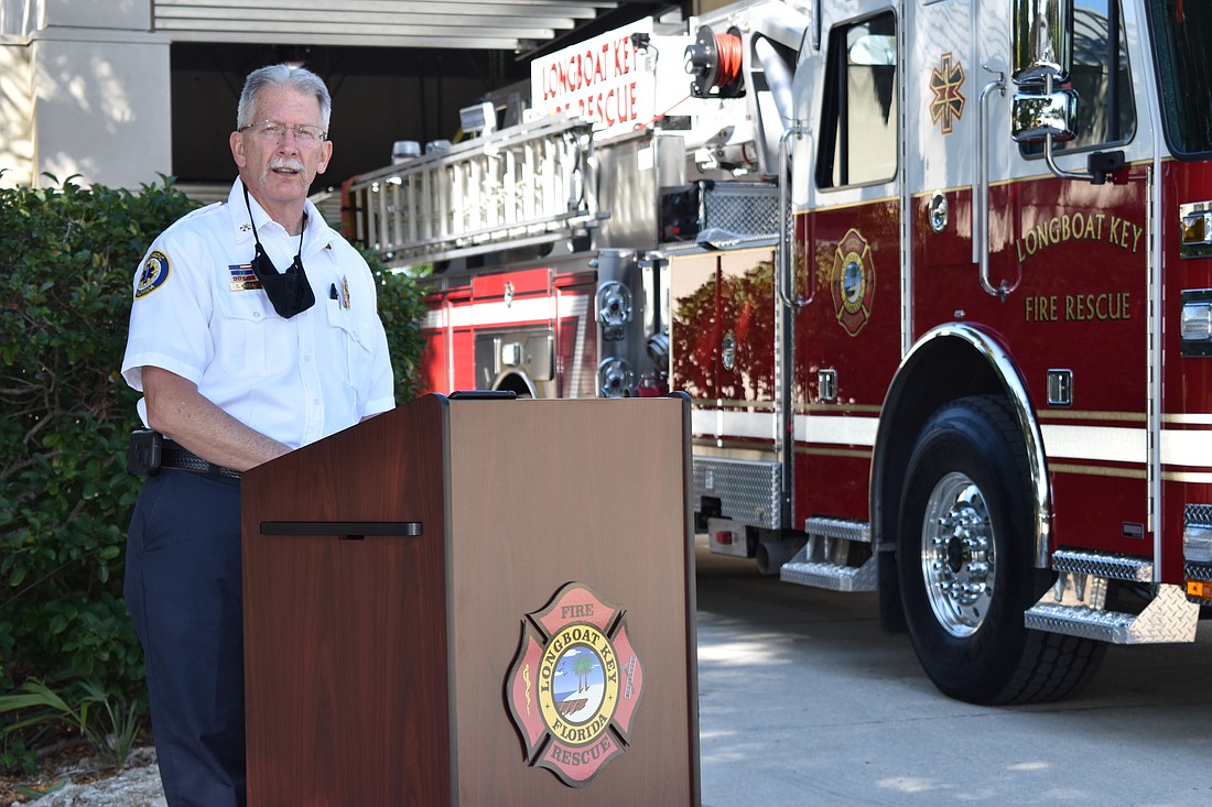 Deputy Chief Chris Krajic spoke during the Jan. 4 fire truck dedication ceremony at 5490 Gulf of Mexico Drive.