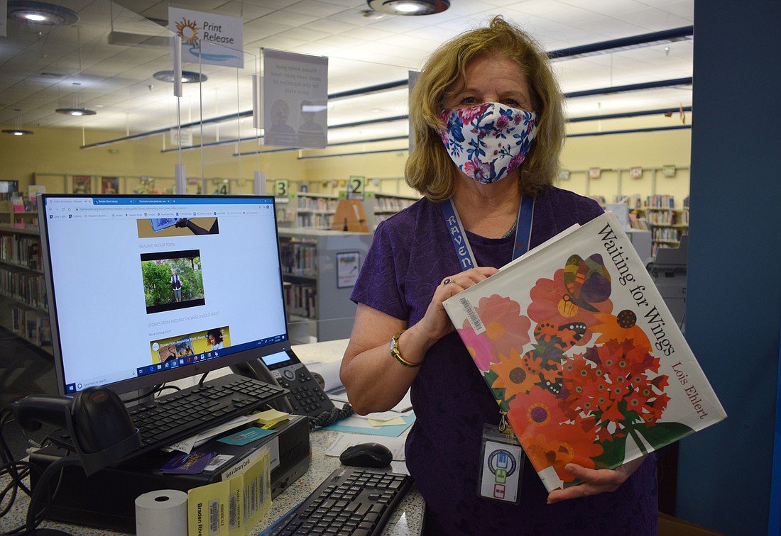 Christine Culp, the youth services librarian at the Braden River Library, uses her storytimes and Reading in Our Town virtual segment to show her viewers different places in Manatee County before reading them a book.