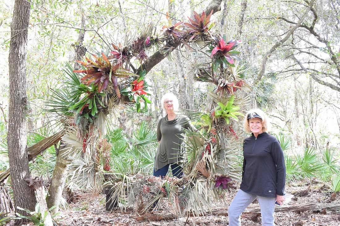 Toni Muirhead and Jamie Reagan, members of Peace Presbyterian Church, create dozens of natural art pieces displayed throughout the Peaceful Path.