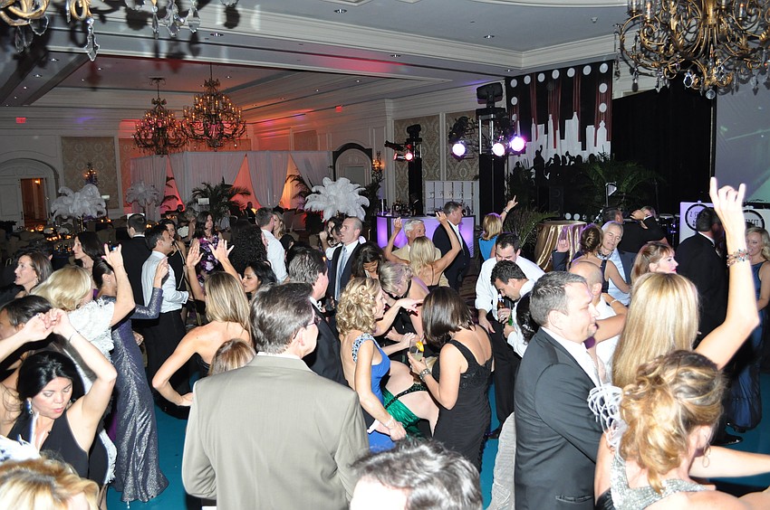 The crowd lets loose on the dance floor.