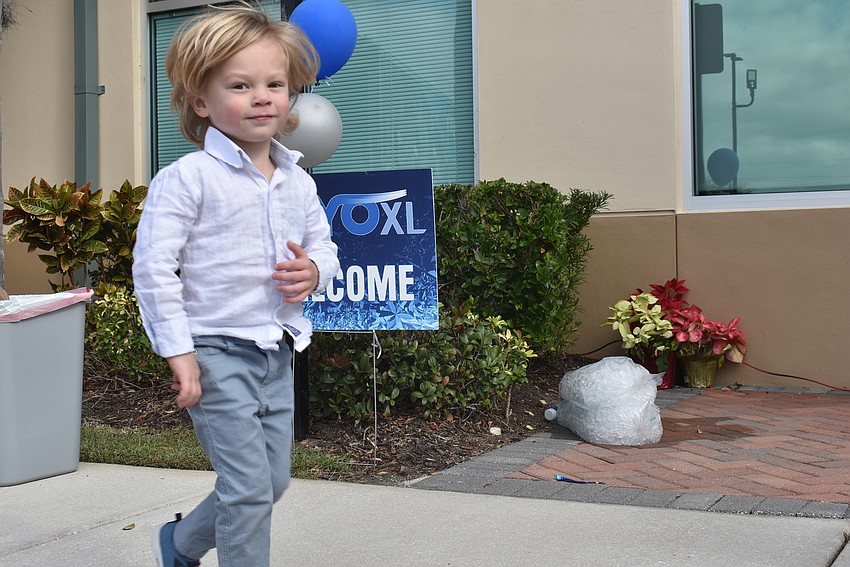 3-year-old Leo Caceres of Sarasota dances to 