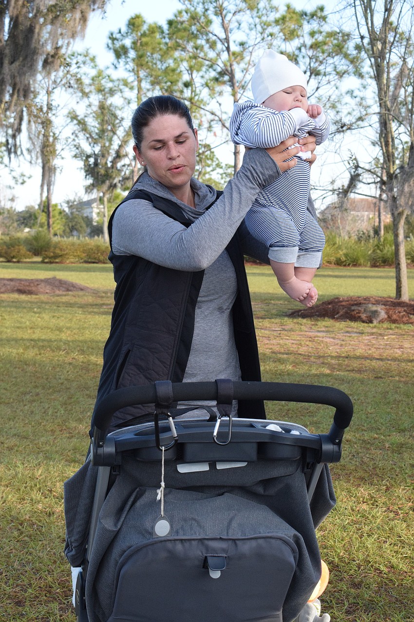 Arbor Grande's Victoria Korotkova connects with her son, Ian Korotkov, while working out with him.