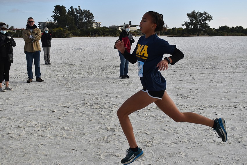 Jasmine France kicks to the finish.