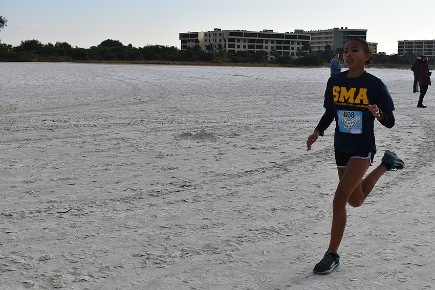 Jasmine France kicks to the finish.