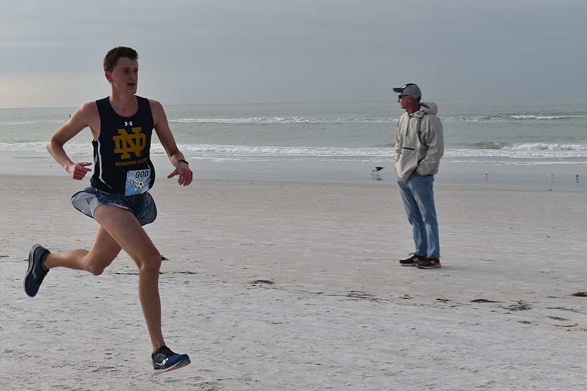 Connor Wozniak runs into the finish.