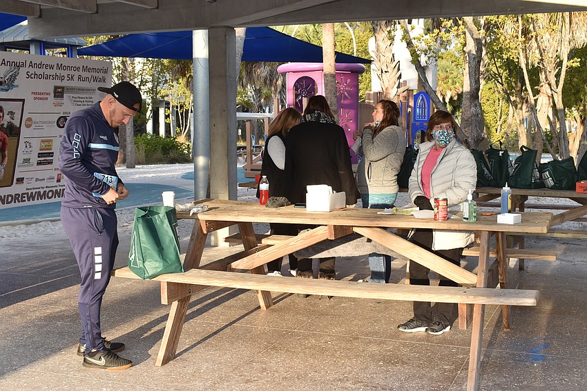 Organizers wore soccer-patterned masks in memory of Andrew Monroe.