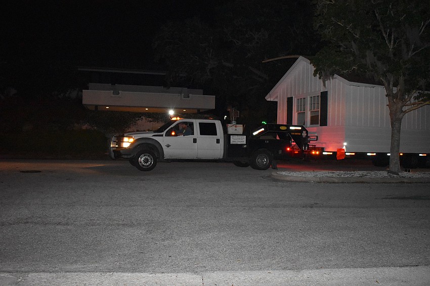 On Wednesday morning, Johnson & Son, Inc. movers moved the historic cottage from 521 Broadway St. to 555 Bay Isles Parkway.