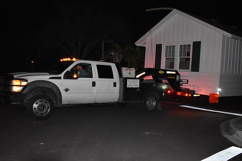 On Wednesday morning, Johnson & Son, Inc. movers moved the historic cottage from 521 Broadway St. to 555 Bay Isles Parkway.
