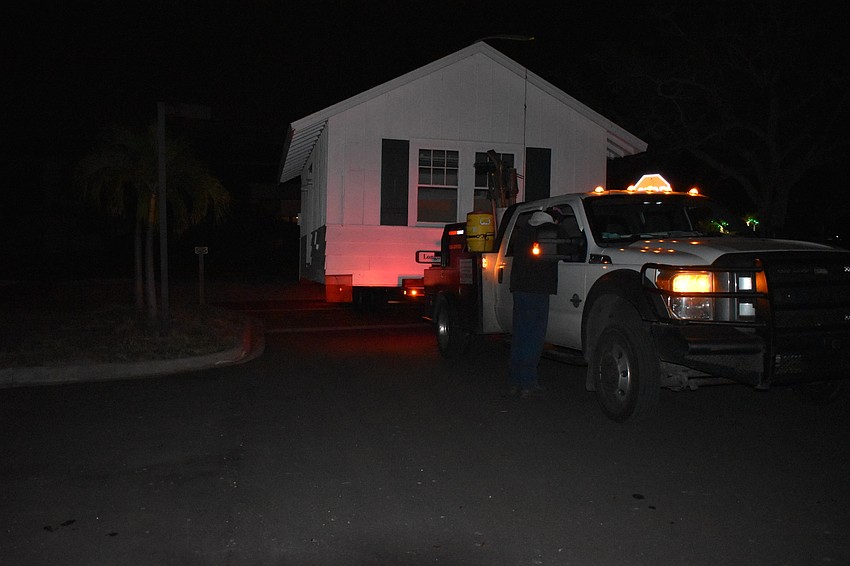On Wednesday morning, Johnson & Son, Inc. movers moved the historic cottage from 521 Broadway St. to 555 Bay Isles Parkway.