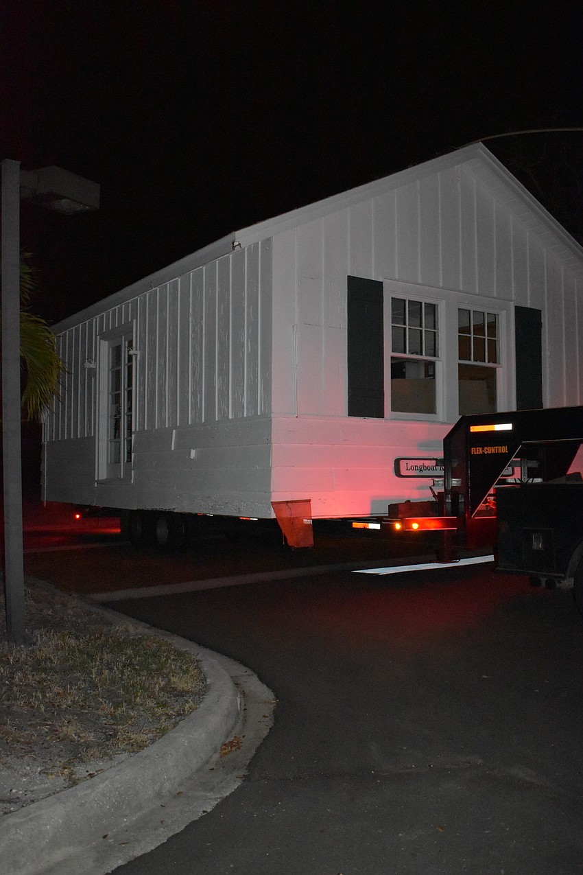On Wednesday morning, Johnson & Son, Inc. movers moved the historic cottage from 521 Broadway St. to 555 Bay Isles Parkway.