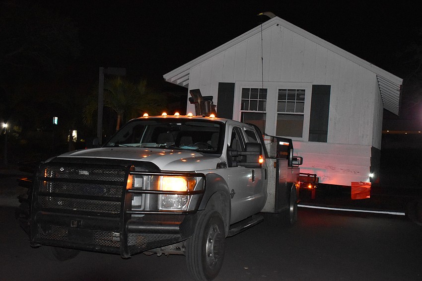 On Wednesday morning, Johnson & Son, Inc. movers moved the historic cottage from 521 Broadway St. to 555 Bay Isles Parkway.