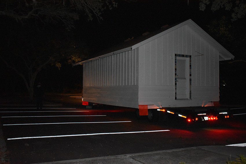 On Wednesday morning, Johnson & Son, Inc. movers moved the historic cottage from 521 Broadway St. to 555 Bay Isles Parkway.