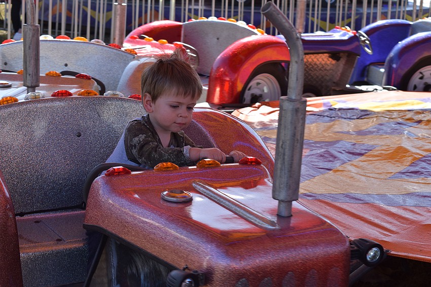 Lakeland's Jedidiah Miller, who is 18 months old, loves going fast in his car ride. His parents, Nathaniel and Heidi Miller, had their first date at the fair and return every year.