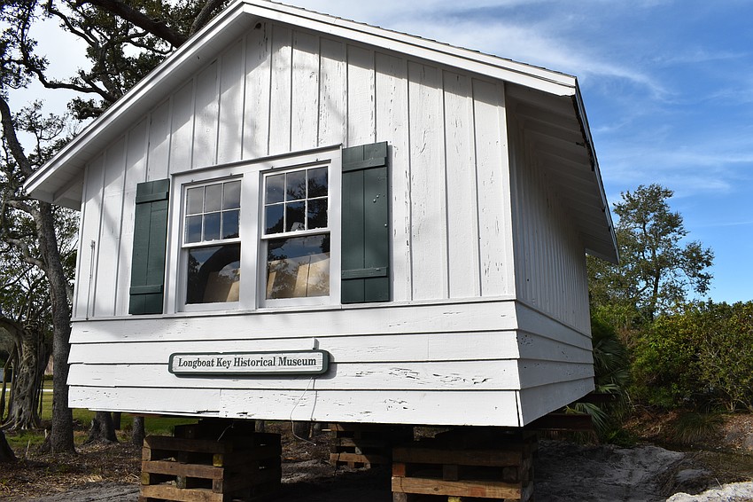 The Longboat Key Historical Society’s cottage is temporarily sitting on cribs. In the coming days, Johnson movers will permanently move the structure to rest on 12 slab piers at 555 Bay Isles Parkway.