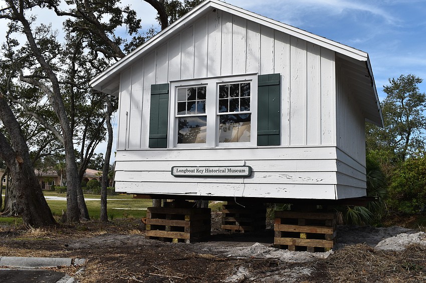 The Longboat Key Historical Society’s cottage is temporarily sitting on cribs. In the coming days, Johnson movers will permanently move the structure to rest on 12 slab piers at 555 Bay Isles Parkway.