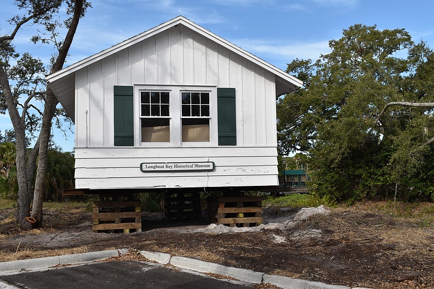 The Longboat Key Historical Society’s cottage is temporarily sitting on cribs. In the coming days, Johnson movers will permanently move the structure to rest on 12 slab piers at 555 Bay Isles Parkway.