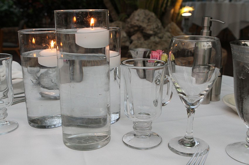 Guests had dinner at spaced-apart tables at the Michael's On East atrium.