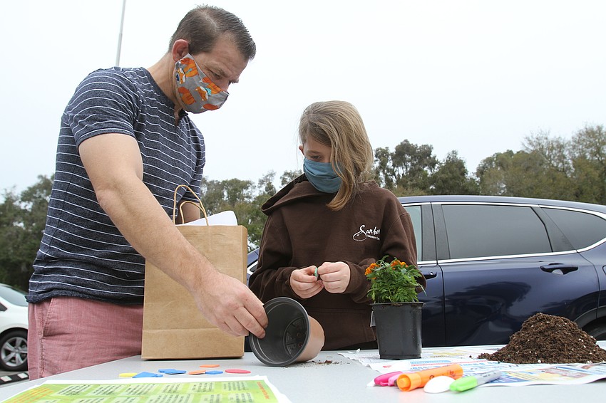 Michael and Carter Hankin started work planting.
