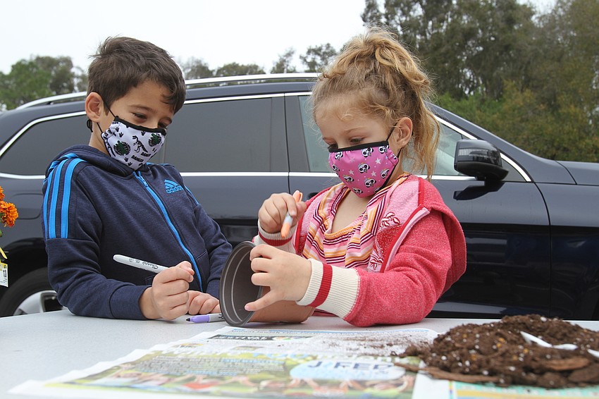Aaron and Norah Jawitz worked together on their flower pot.