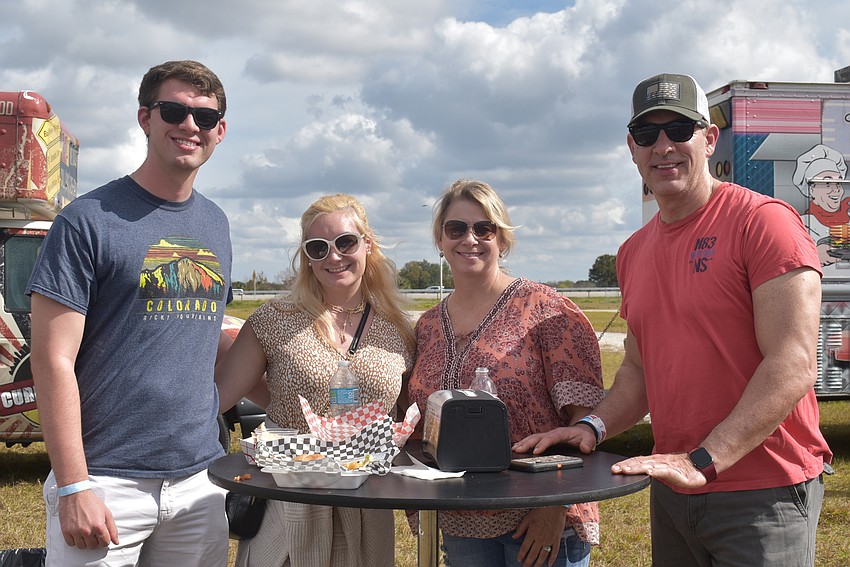 Northern Virginia residents Noah White and Kristin Moro are visiting Sarasota residents Tammy and Jeff White. The former two tried grilled cheese sandwiches at Currywurst Truck. The latter two tried burgers at Smokin' Momma Lora.