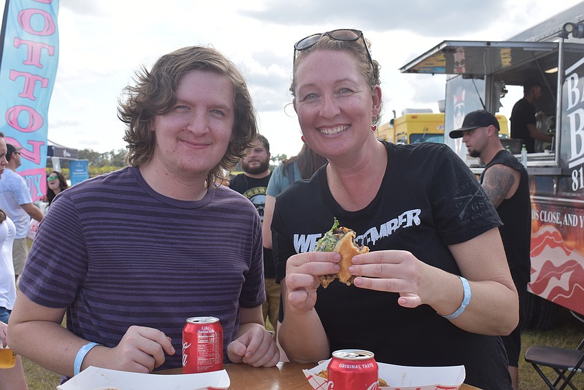 Sarasota residents Chase Barker and Amy Trefz tried the Bugsy and Gotti burgers, respectively, at Bacon Boss. The Gotti is a cheeseburger with smoked gouda and bacon jam, while the Bugsy is a barbecue burger with bacon.